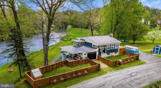 2 BEDROOM COTTAGE ON THE CACAPON RIVER WITH 7 ACRES