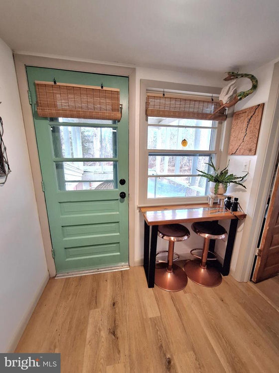 2 BEDROOM COTTAGE ON THE CACAPON RIVER WITH 7 ACRES