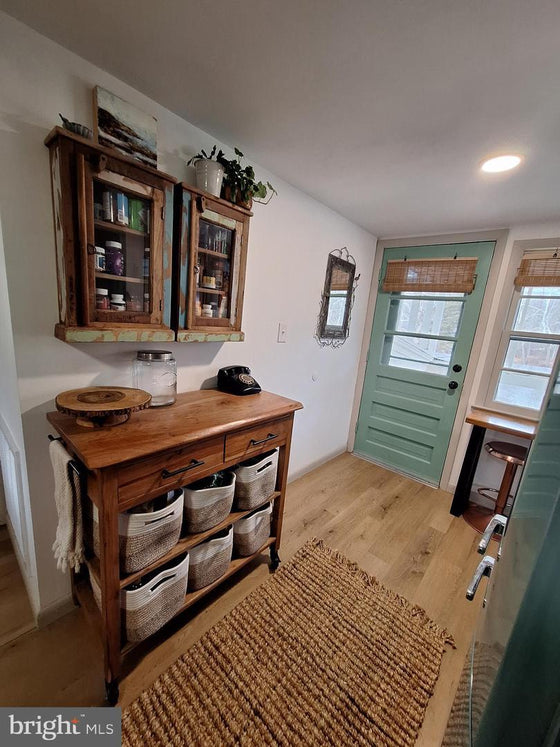 2 BEDROOM COTTAGE ON THE CACAPON RIVER WITH 7 ACRES