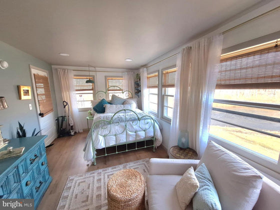 2 BEDROOM COTTAGE ON THE CACAPON RIVER WITH 7 ACRES