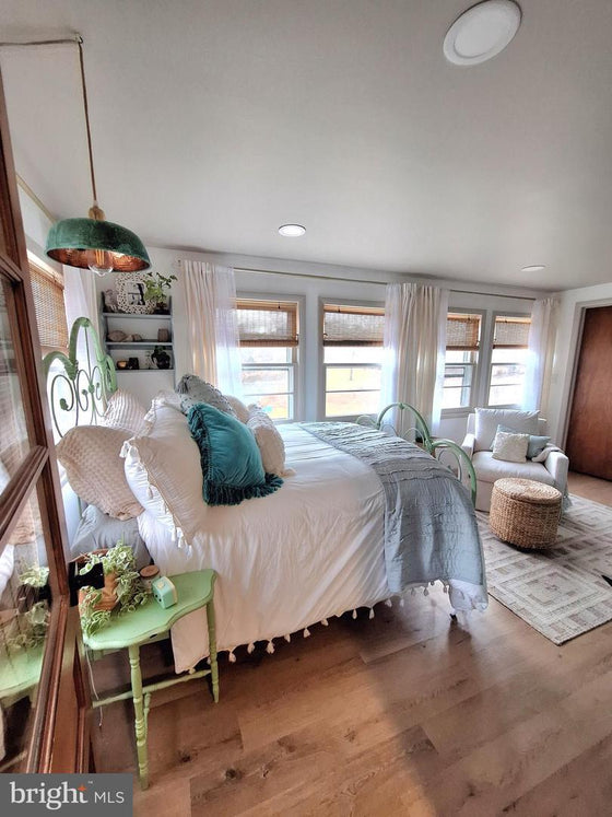 2 BEDROOM COTTAGE ON THE CACAPON RIVER WITH 7 ACRES