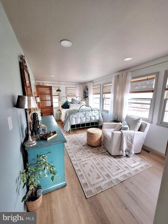 2 BEDROOM COTTAGE ON THE CACAPON RIVER WITH 7 ACRES