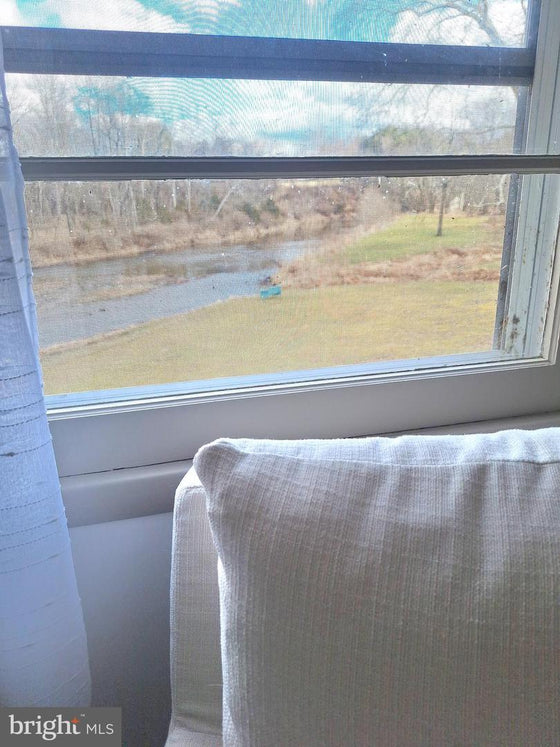 2 BEDROOM COTTAGE ON THE CACAPON RIVER WITH 7 ACRES