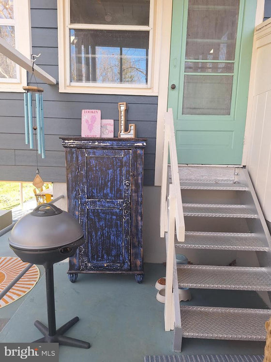 2 BEDROOM COTTAGE ON THE CACAPON RIVER WITH 7 ACRES