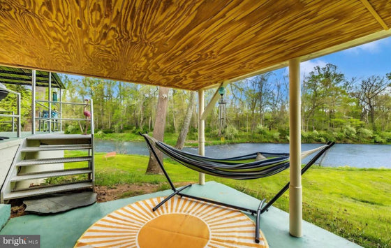 2 BEDROOM COTTAGE ON THE CACAPON RIVER WITH 7 ACRES